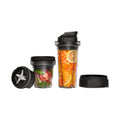 Vitamix Blending-Cup & Bowl Starterset befüllt: Bowl mit Tomate und Kräutern, Cup mit Orange und Karotte